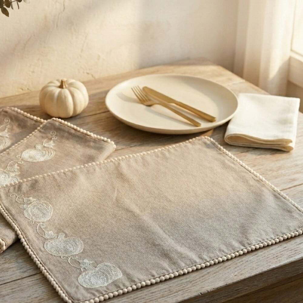​Rachel Zoe Cotton Tan Pumpkin Embroidered Pom Pom Placemats Set of 4 Minimalist